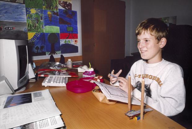 Boy at a desk gaming