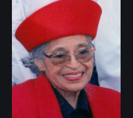 Older woman in red hat