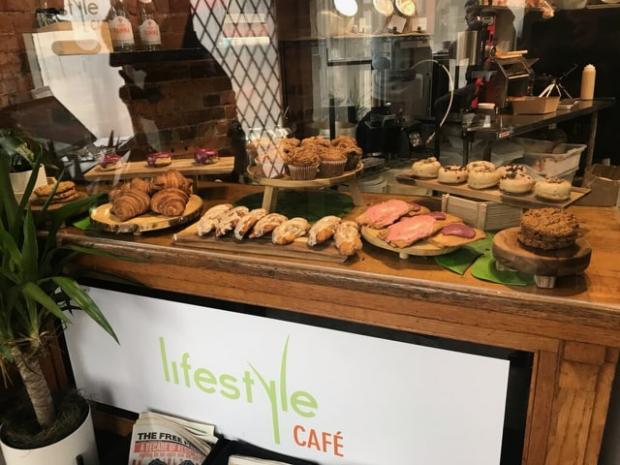 Restaurant counter with pastries displayed