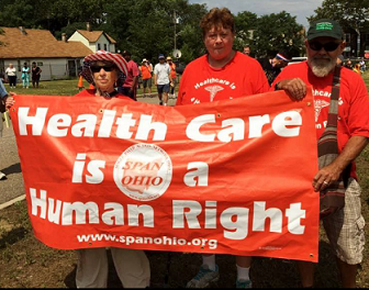 People with sign Health Care is a Human Right