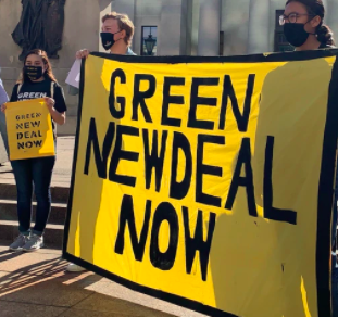 Sign saying Green New Deal Now