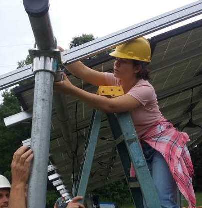 Woman installing solar