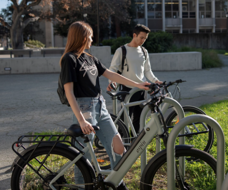 Woman and man on ebikes