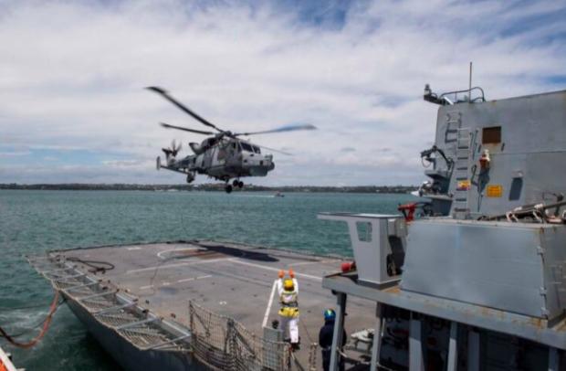 Helicoper landing on naval ship
