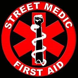 Red circle with star shape in middle with fist and snake, words Street Medic First Aid