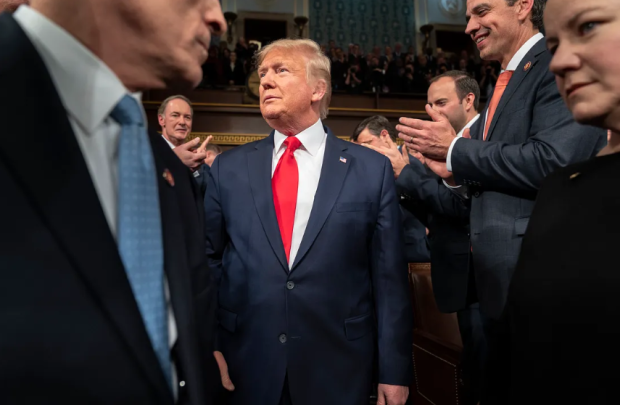 Trump and people clapping