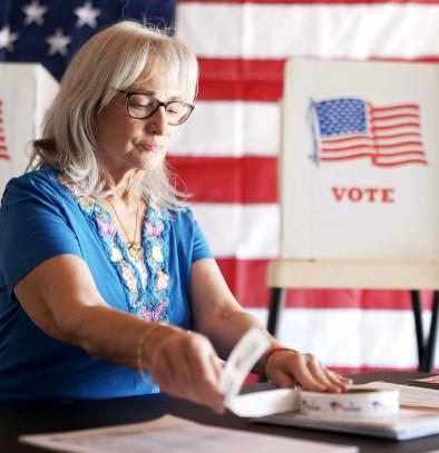 Older white woman voting