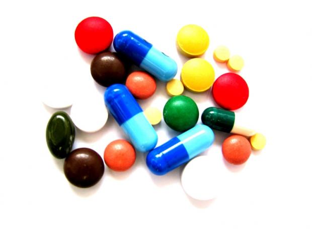A pile of colorful and different sized pills