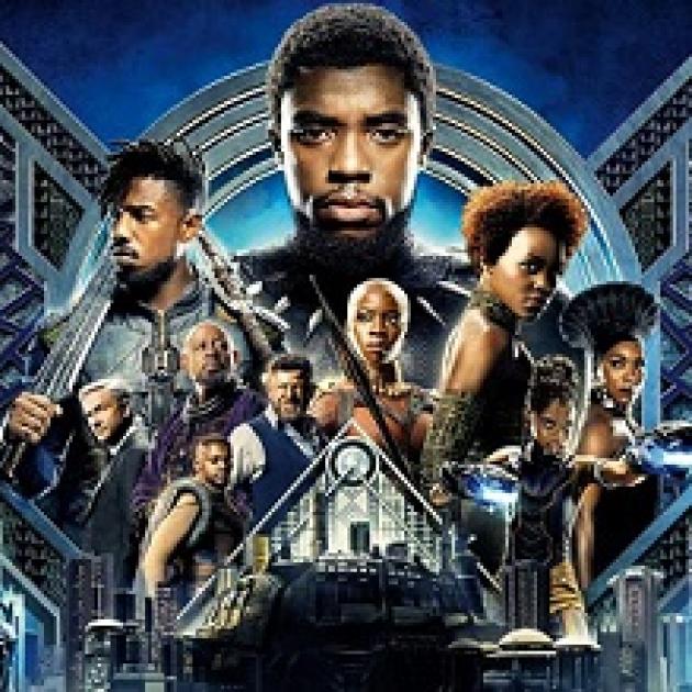 Lots of black people's faces and bodies posing like a movie poster wearing superhero type clothes against a blue background that looks high tech