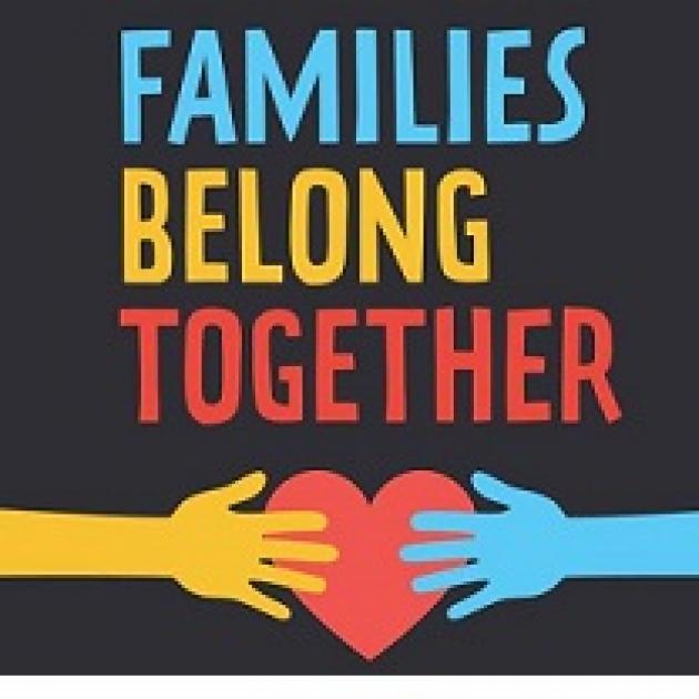 Black background with a yellow hand coming from the left and a blue hand from the right holding a red heart in the middle and the words Families Belong Together