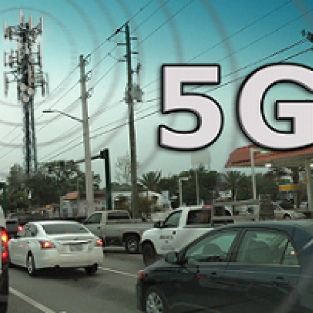 Words 5G with street scene with cars and a cell tower 