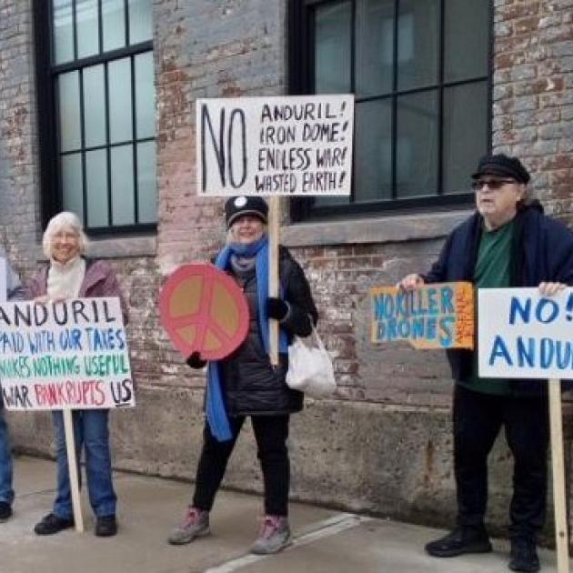 People holding signs