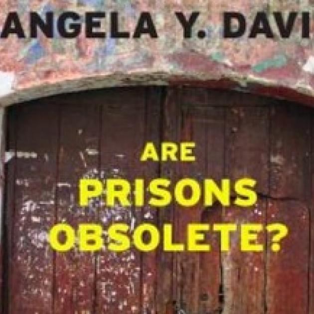 A wooden door and the words Angela Y. Davis and Are Prisons Obsolete?