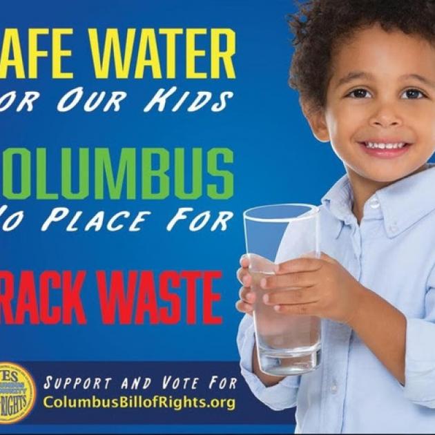 Young black child holding a glass of water and the words Safe Water 