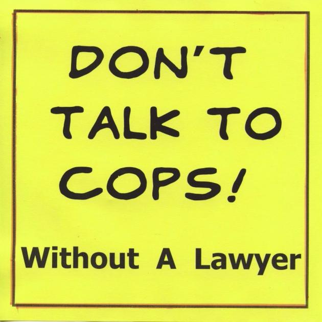 Yellow background with words "Don't Talk to Cops without a lawyer"