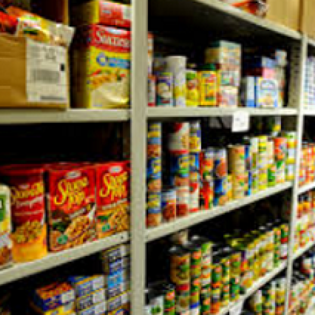 Shelves of canned food in a food pantry