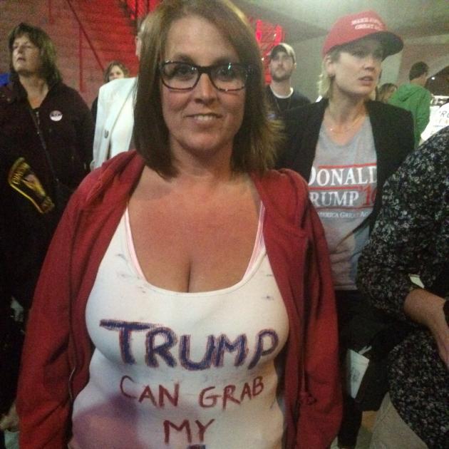 Woman wearing Trump can grab my...