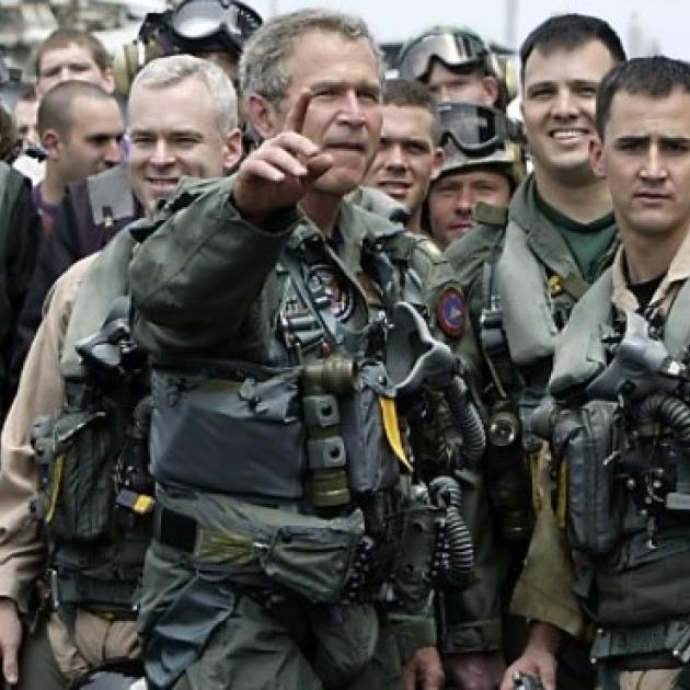 George W Bush with soldiers