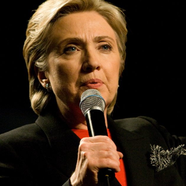 Hillary Clinton talking into a mic