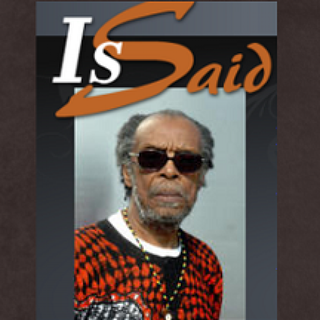Black man with gray hair and sunglasses and the words Is Said