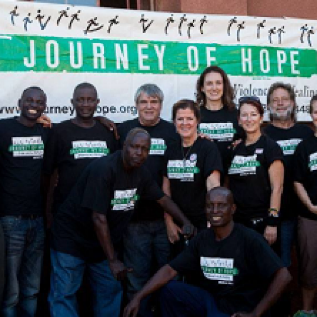 Journey of Hope people with banner