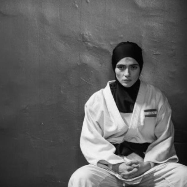 Person sitting in judo outfit
