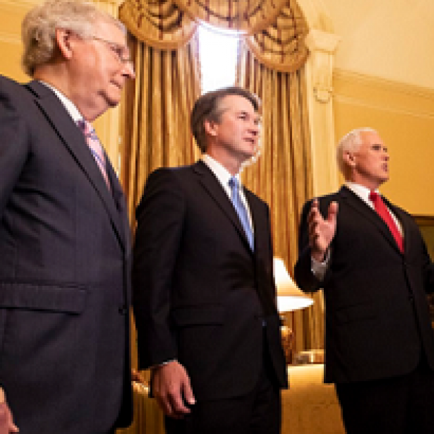 Three older white guys in a room with fancy curtains