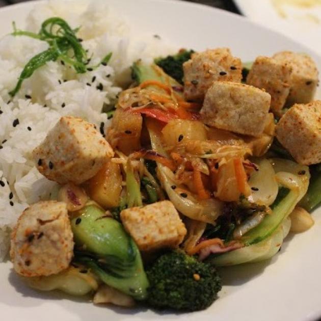 Tofu with grilled vegetables, and macadamia nuts.