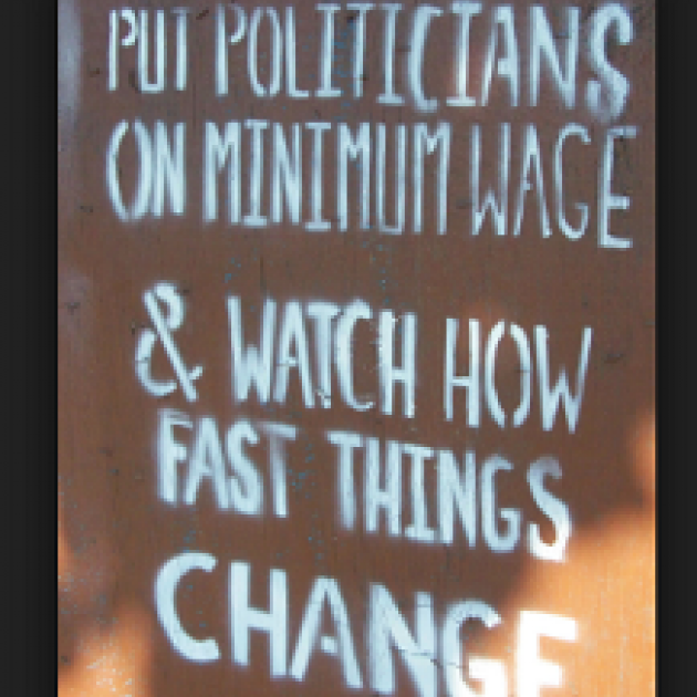Sign that says Put Politicians on minimum wage and watch how fast things change