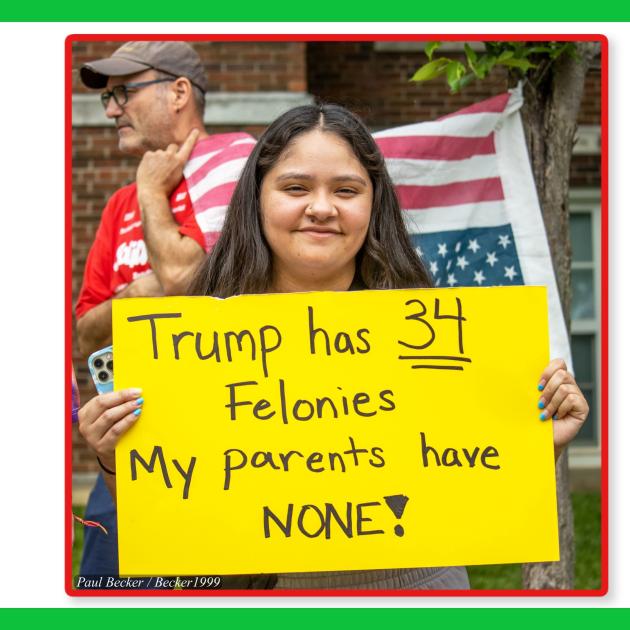Woman with sign saying Trump has 34 felonies, my parents have NONE