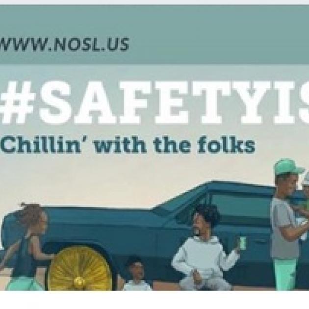 People outside next to a truck, the words #Safetis Chillin' with the folks