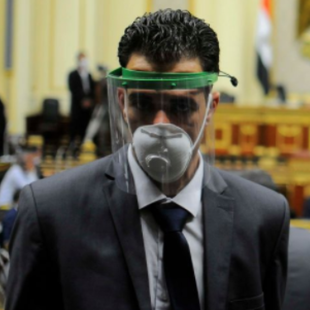 Man in mask and face shield