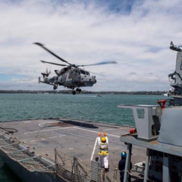 Helicoper landing on naval ship