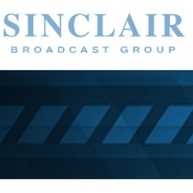 Blue design with sideways rectangles at the bottom and words Sinclair broadcast group at the top