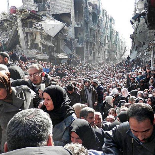 Bombed building and Syrian people fleeing