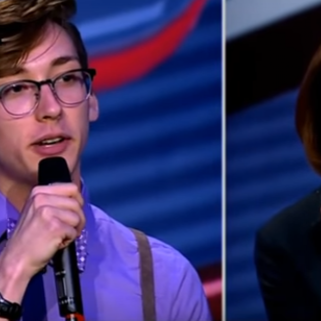 Trevor Hills talking into a mic on one side and Nancy Pelosi looking down on the other side