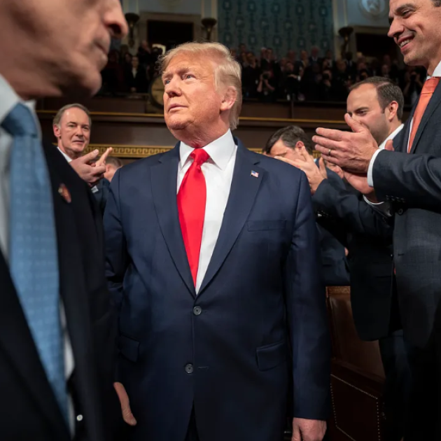 Trump and people clapping
