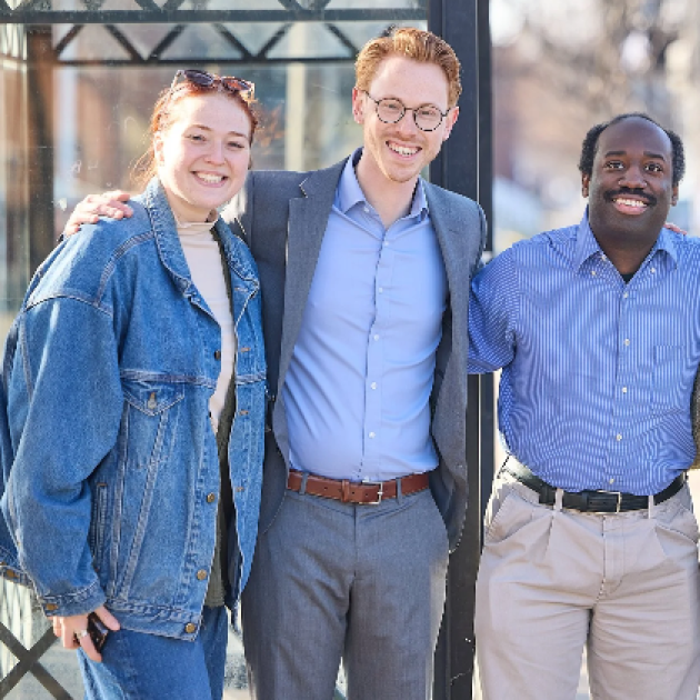 Jesse Vogel with four volunteers