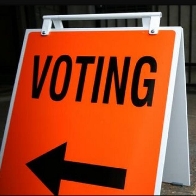 Orange voting sign