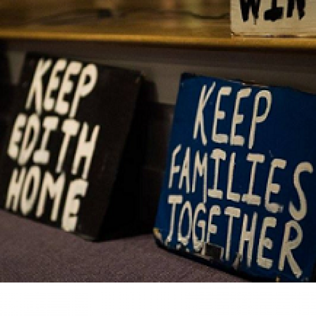 Two stark protest signs one saying Keep Edith Home and one saying  Keep Families Together