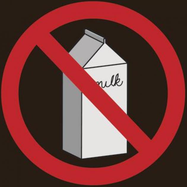 Drawing of a carton with the word milk on it and a red circle with line through it as in the "no" symbol against a black background