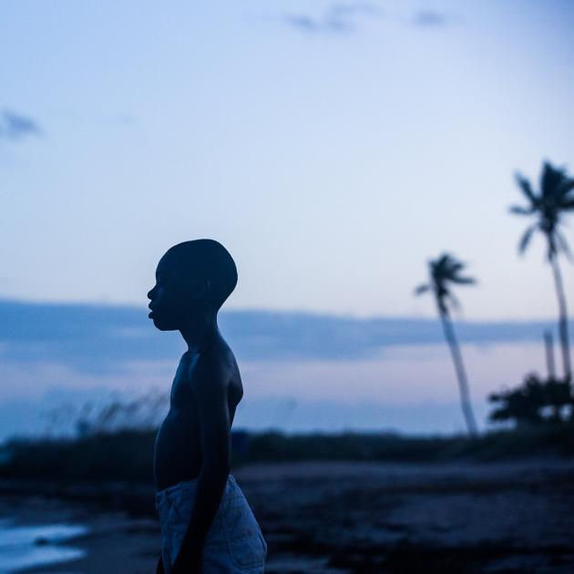 Boy standing on beach