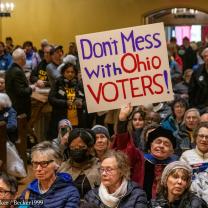People protesting with sign saying Don't Mess with Ohio Voters