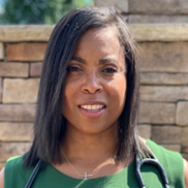 Black woman in green dress