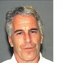 Middle-aged white man with gray hair and white shirt looking quizzical