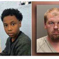 Young black child and white man