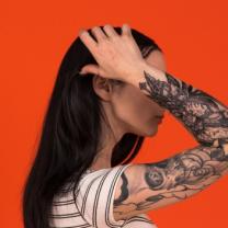 Girl with lots of tatoos
