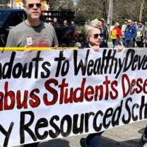 People holding banner in a march
