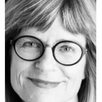 White woman with glasses