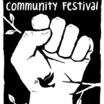 A fist with the words Community Festival